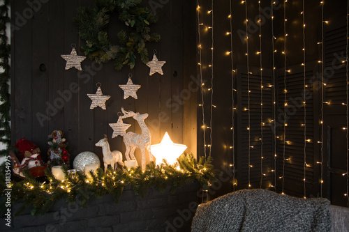 Christmas interior with stars and garland on a background