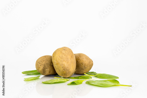 Potatoes On White Background With Reflection