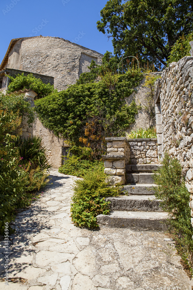 Old house in the medieval village Simiane-la-Rotonde, Provence, France