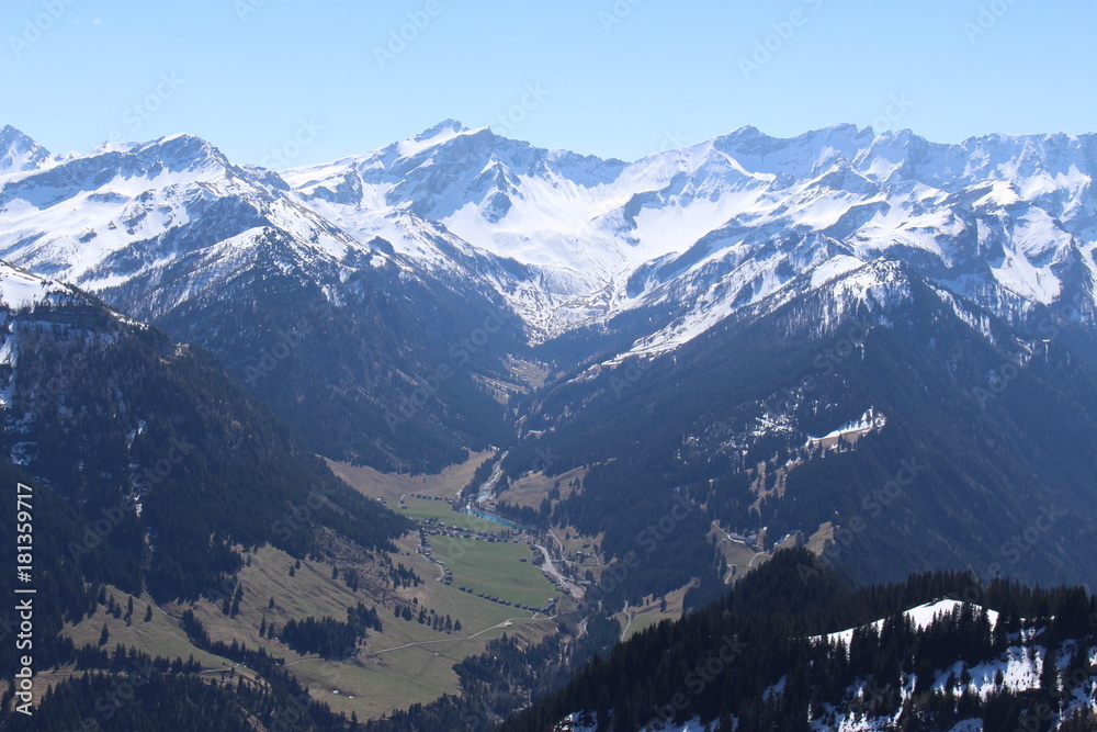 Landscape of snowy Alp mountains with forests, taken from Alpspitz peak in Gaflei village in the municipality of Triesenberg in Principality of Liechtenstein. Landscape of snowy Alp mountains with forests, taken from Alpspitz peak in Gaflei village in the municipality of Triesenberg in Principality of Liechtenstein.