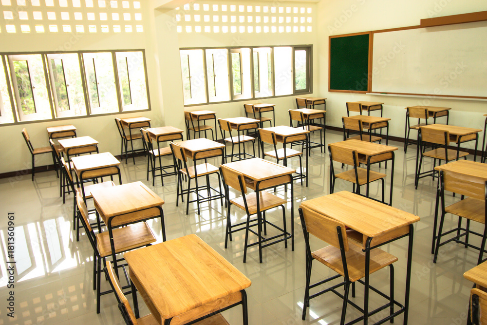 Lecture room or School empty classroom with desks and chair iron wood in high school thailand, interior of