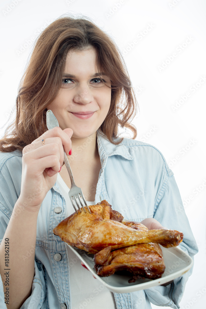 woman eats fried chicken