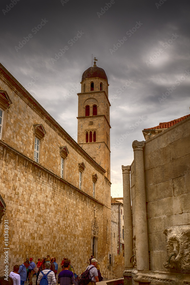The main street (Stradun or Placa), the Franciscan Monastery, St. Saviour Church in Dubrovnik, Croatia The main street (Stradun or Placa), the Franciscan Monastery, St. Saviour Church in Dubrovnik, Croatia
