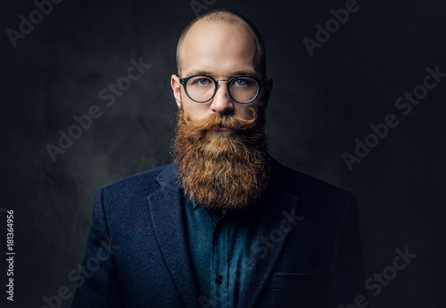 Redhead bearded male in a suit. photo