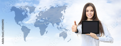 international contact and travel concept smiling woman with like thumb up showing digital tablet on world map background