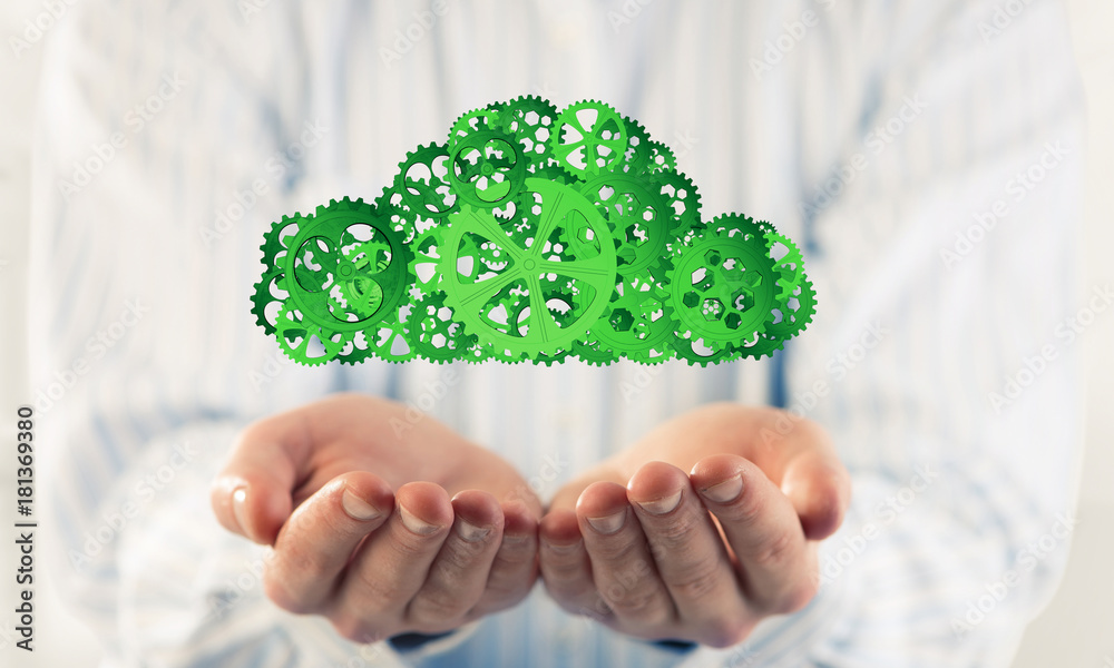 Man presenting in his palms cloud computing concept as mechanism Man presenting in his palms cloud computing concept as mechanism