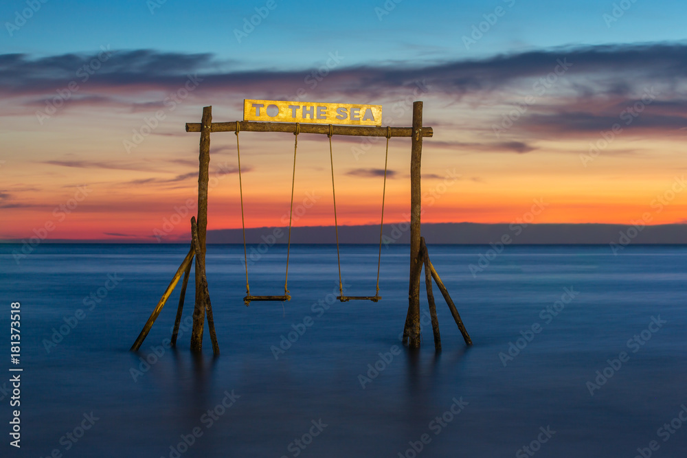 Wooden swing on the beach of Koh Kood island in Thailand. Wooden swing on the beach of Koh Kood island in Thailand.