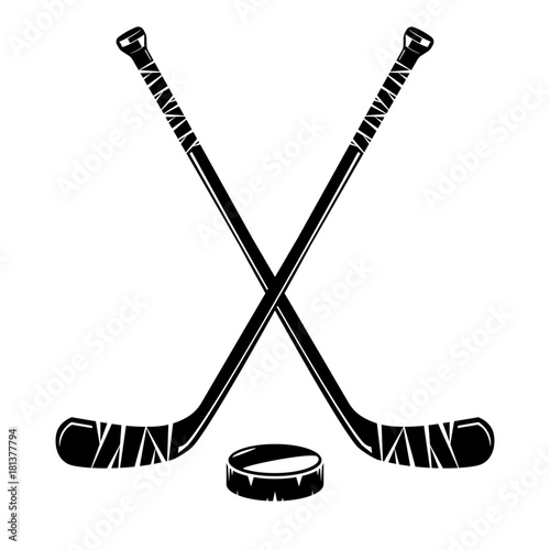 Hockey sticks and puck
