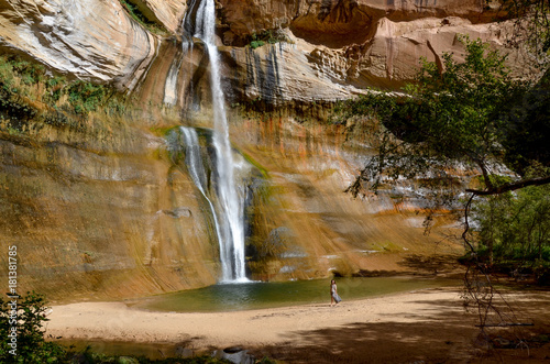 girl standing near plunge pool at the bottom of Lower Calf Creek falls 
Grand Staircase - Escalante National Monument, Utah photo