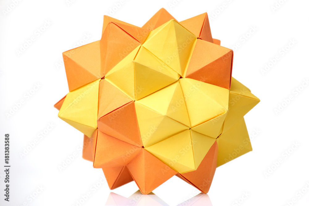 Modular origami model on white. Yellow and orange, 3D spiky ball. Visual  art, geometry, paper folding. Stock Photo | Adobe Stock