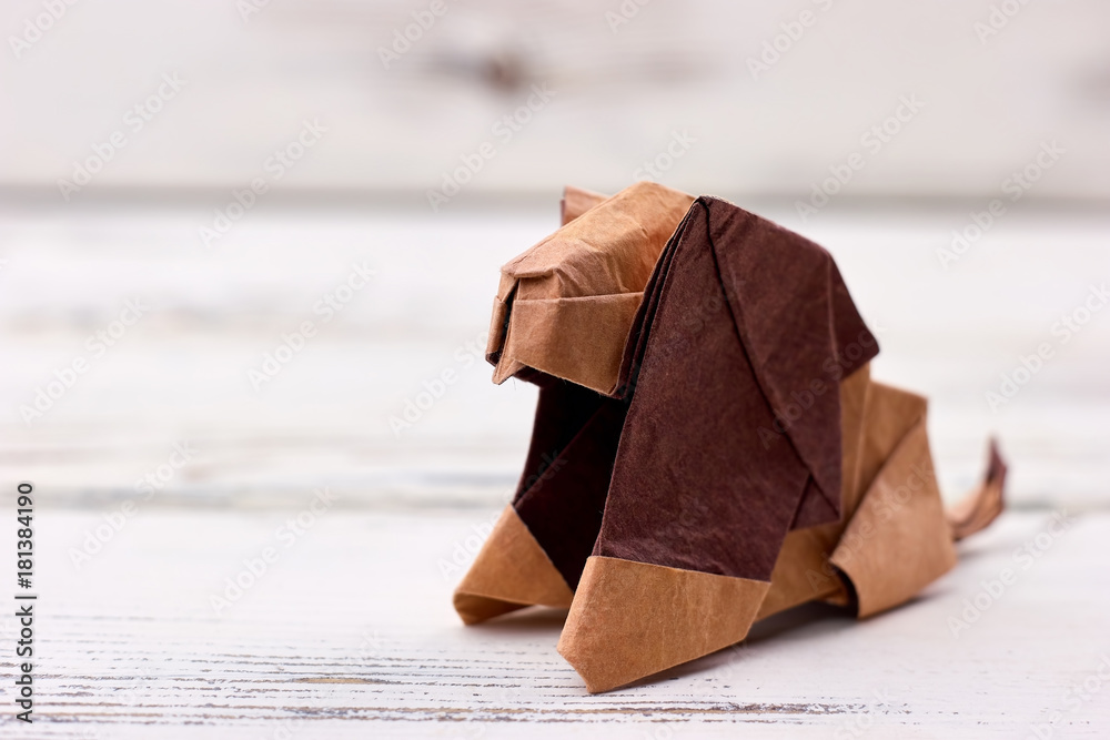 Origami lion 3D model. Folding paper into wonderful animal figurine. Zoo,  children's art project idea. Stock Photo | Adobe Stock
