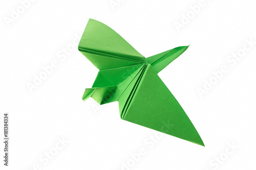 Green paper crane on white. Classic origami model. Japanese art, traditions and culture.