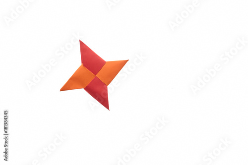 Four pointed shuriken origami, isolated on white. Made of red and orange paper. Japanese art of folding. Free Download Four pointed shuriken origami, isolated on white. Made of red and orange paper. Japanese art of folding. - GFXLoad