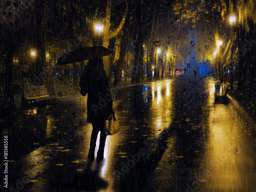 Obraz na płótnie Girl at the night city lights during the rain at the evening w salonie