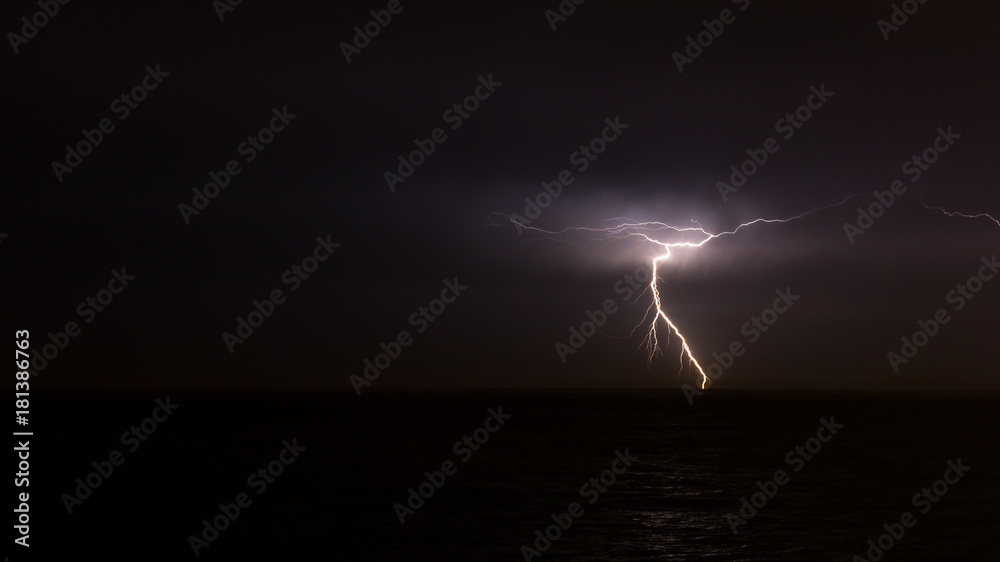Lightning on the sky over the ocean Lightning on the sky over the ocean