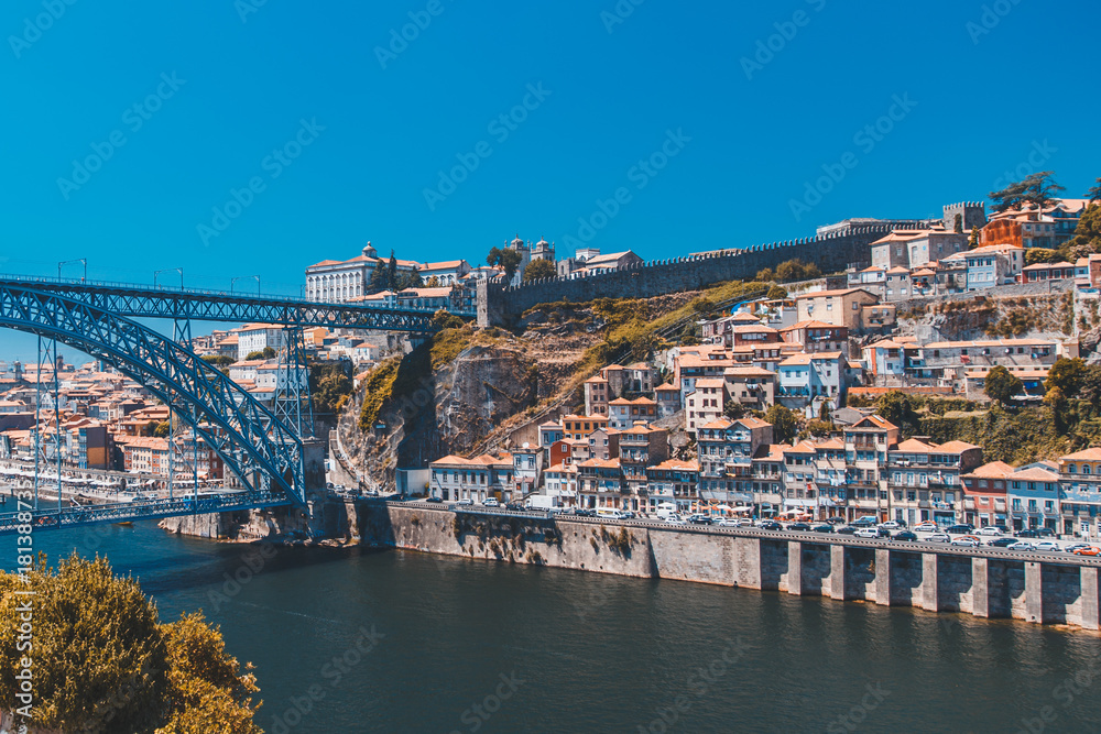 Panoramic aerial view of Dom Luis Bridge in Porto in a beautiful summer day, Portugal