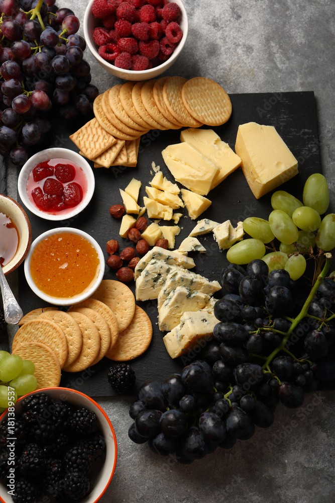 Cheese platter with grapes and berries Cheese platter with grapes and berries