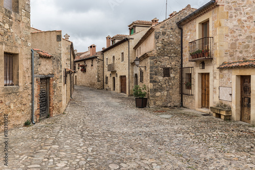 Typical street in the historical town of Pedraza. Segovia. Spain. photo