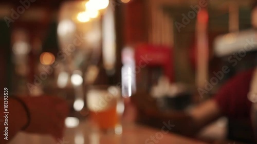 Wallpaper Mural Beer is pouring into the angled glass. Stout, Light, Unfiltered beer, ready to drink beer. Torontodigital.ca