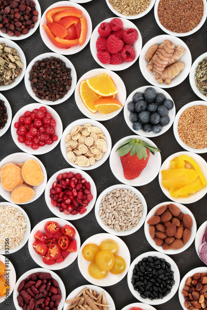 Healthy diet food to promote heart health with super food of fruit, vegetables, seeds, nuts, spice and herbs used in herbal medicine. High in omega 3 fatty acids, anthocyanins and antioxidants. Healthy diet food to promote heart health with super food of fruit, vegetables, seeds, nuts, spice and herbs used in herbal medicine. High in omega 3 fatty acids, anthocyanins and antioxidants.