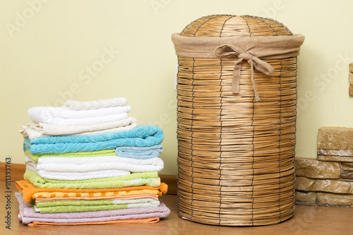 Basket for laundry in the bathroom. photo