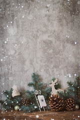Christmas tree against concrete wall