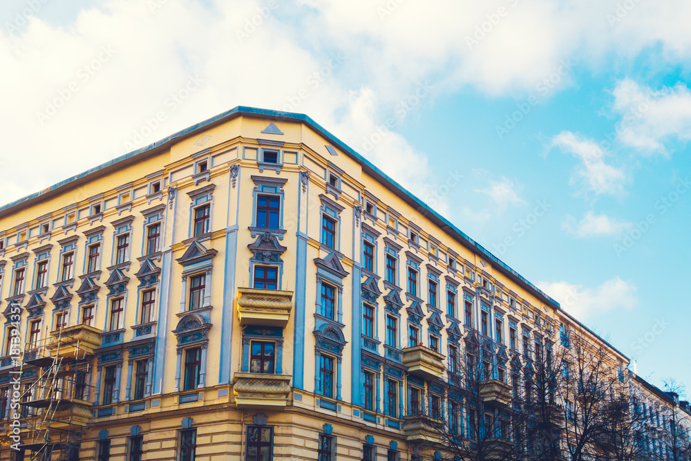 Fototapeta premium beautiful yellow and blue facaded residential building at berlin, germany
