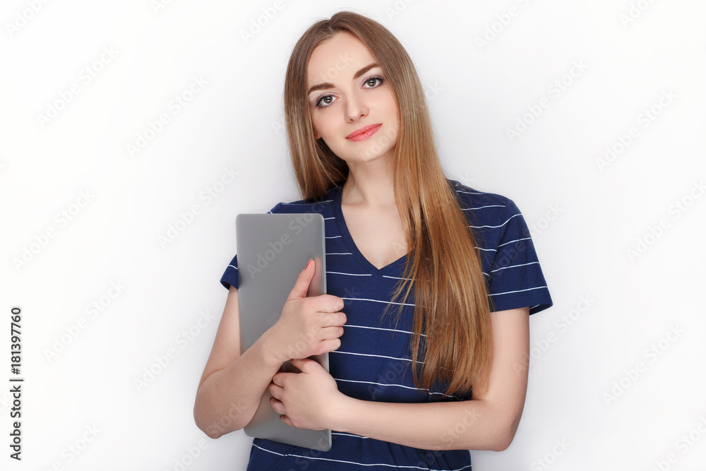 Cheerful attractive caucasian blonde woman with using slim elegant notebook computer isolated on a white background Cheerful attractive caucasian blonde woman with using slim elegant notebook computer isolated on a white background