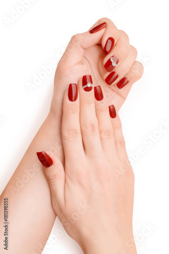 Tela Woman hands with red nail polish isolated with clipping path