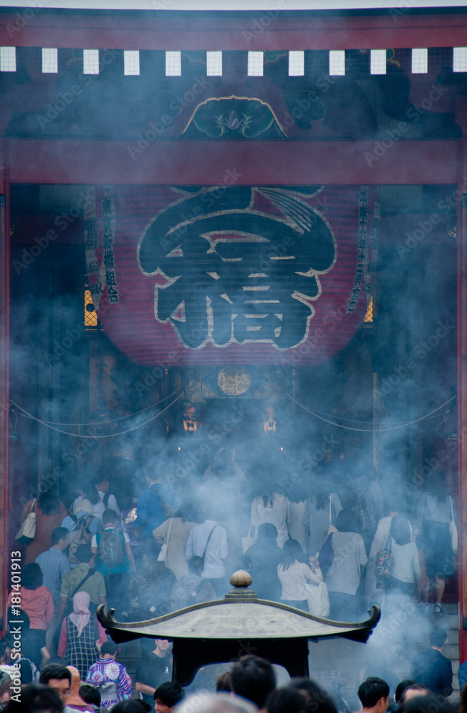Fototapeta premium Smoke scene of Grand traditional big lantern of Sensoji temple in Tokyo.