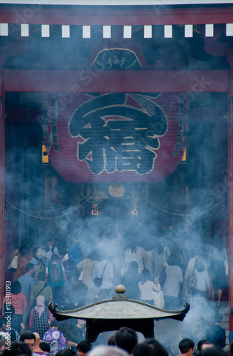 Smoke scene of Grand traditional big lantern of Sensoji temple in Tokyo.