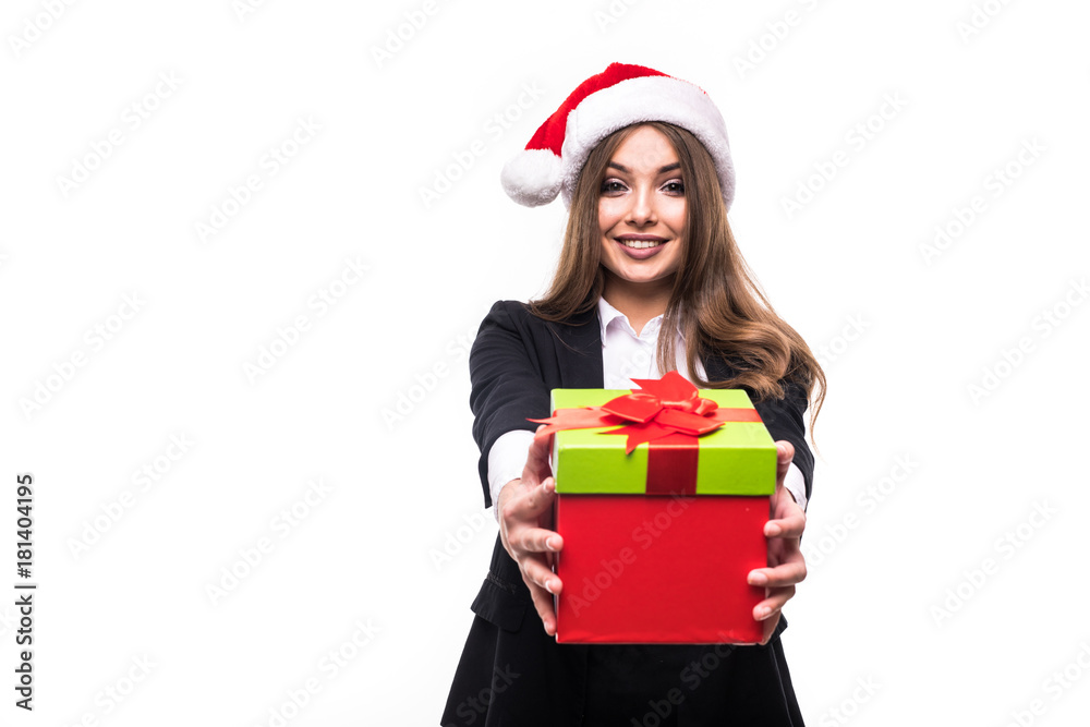 Businesswoman wearing Santa hat holding red gift box isolated on white background Businesswoman wearing Santa hat holding red gift box isolated on white background