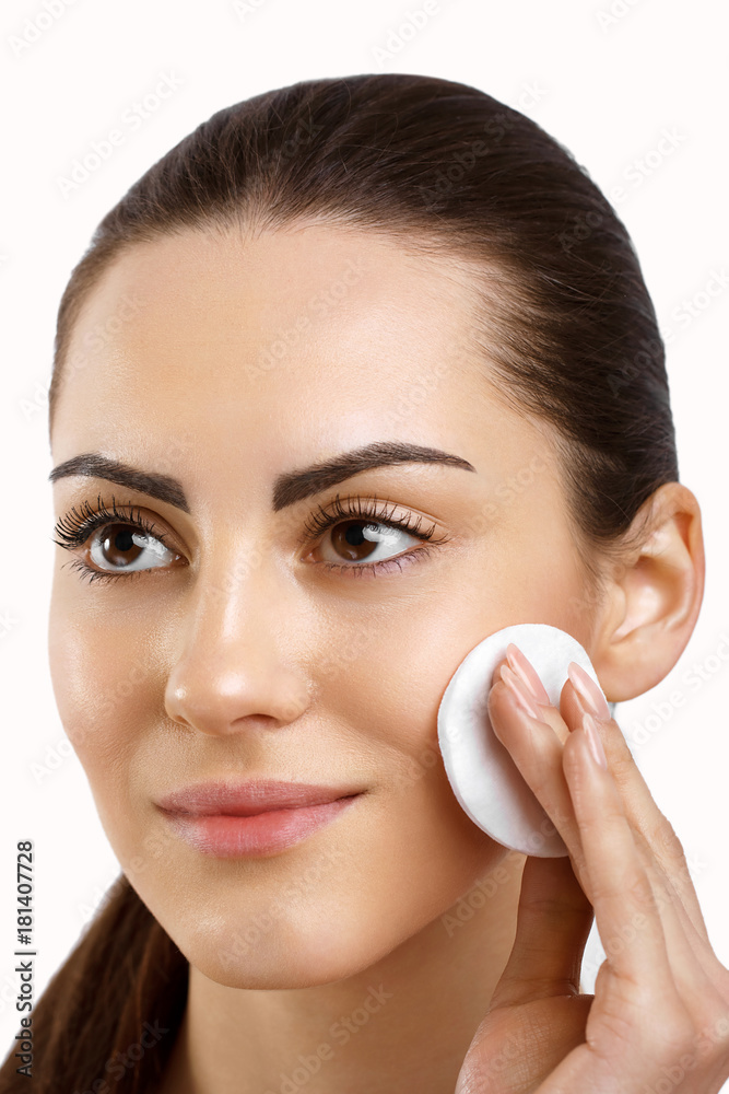 Beauty Face.Beautiful Woman With Natural Makeup.Skin Care.Woman Removing Face Makeup With Cotton Pad. CloseUp Girl With Nude Makeup Touching Perfect Soft Skin,Cleaning Fresh Face With Facial Tonic. Beauty Face.Beautiful Woman With Natural Makeup.Skin Care.Woman Removing Face Makeup With Cotton Pad. CloseUp Girl With Nude Makeup Touching Perfect Soft Skin,Cleaning Fresh Face With Facial Tonic.