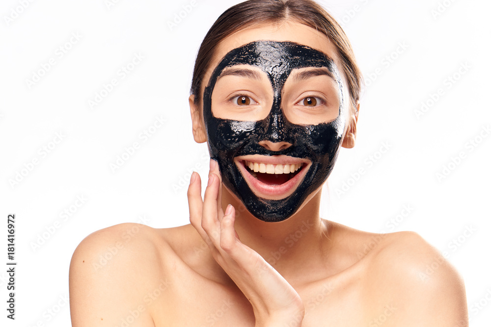 Black coal cosmetic face mask, woman on white isolated background