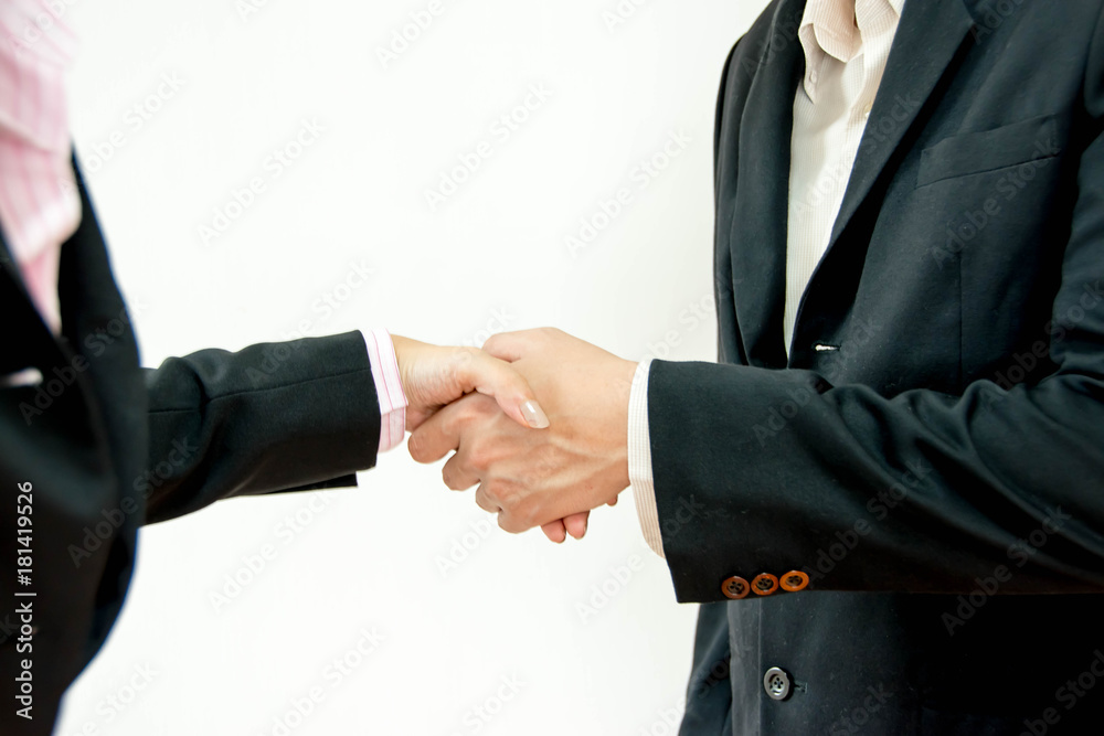 handshakes of business people in suit, white background 