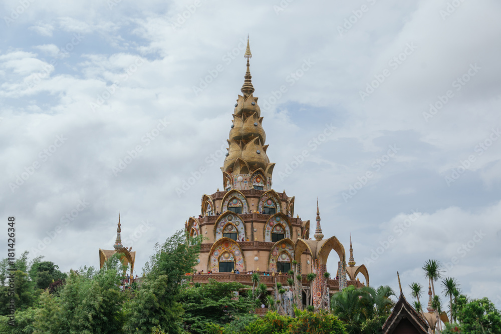 Naklejka premium White big buddha aerial view with mountain background at Wat Prathat Phasornkaew, Khao Kho, Phetchabun, Thailand