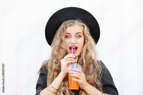 Attractive hipster girl pos...