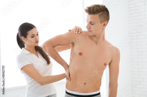 Physiotherapist working wit...