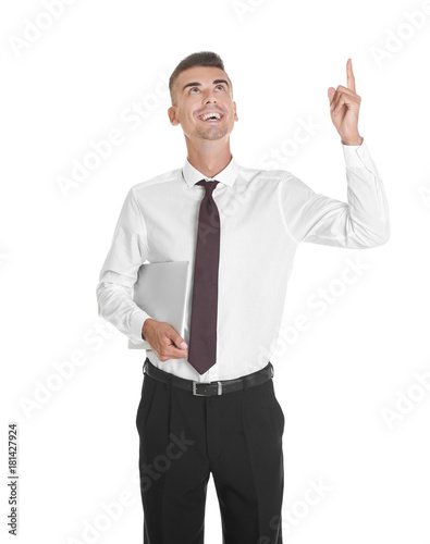 Young man with laptop on wh...