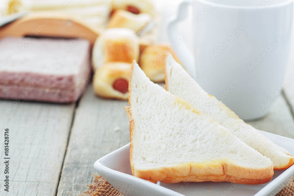 Bread in plate on table. Bread in plate on table.