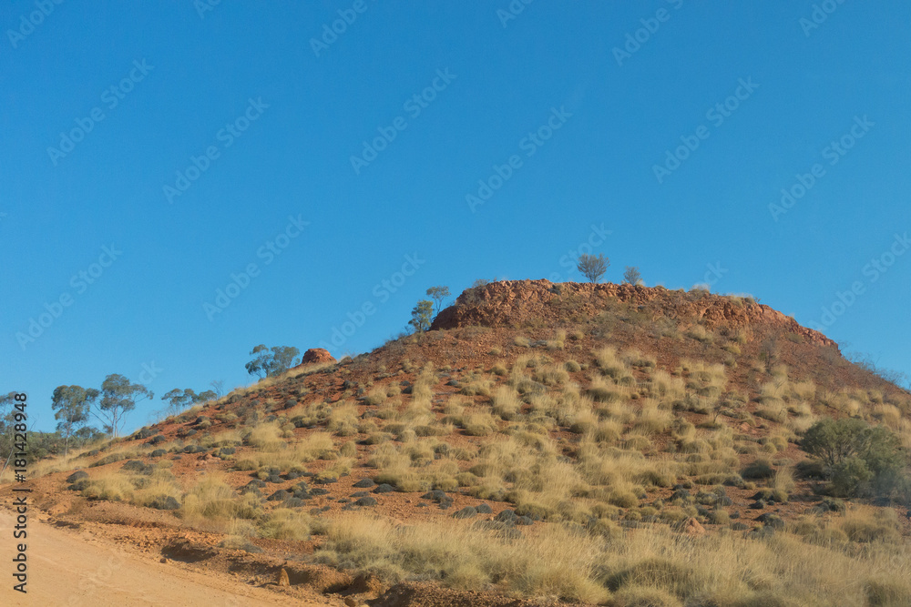 Small mesa in arid landscape near Lark Quarry Small mesa in arid landscape near Lark Quarry