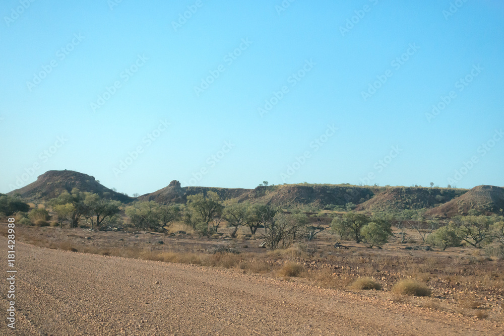 Small mesas in arid landscape near Lark Quarry