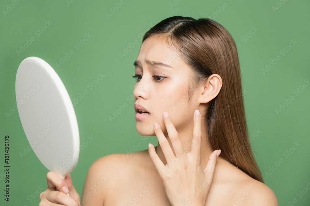 Φωτογραφία beauty girl of half latina and half asian who checks her skin, skin care, acne t