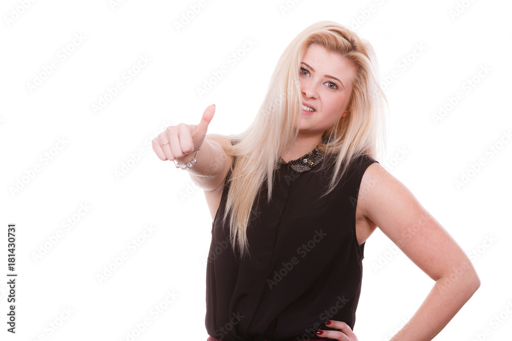 Smiling blonde woman making thumb up gesture Smiling blonde woman making thumb up gesture