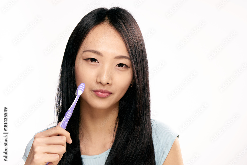 Asian, toothbrush, cleanliness of teeth, woman on white isolated background Asian, toothbrush, cleanliness of teeth, woman on white isolated background