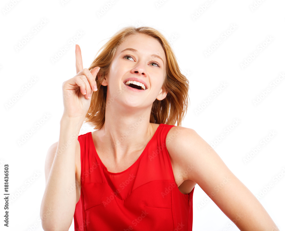 Young woman pointing at something on a white background Young woman pointing at something on a white background