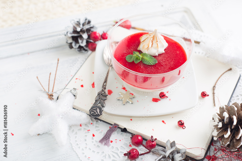 red fruit Panacotta with green mint leaves red fruit Panacotta with green mint leaves