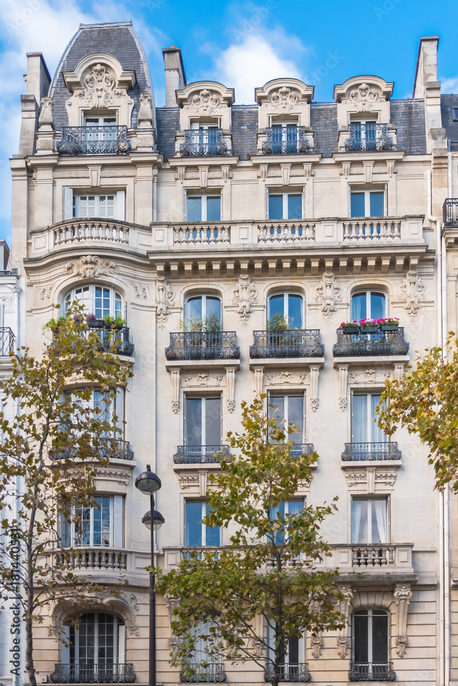 Paris, typical facade in the center, beautiful building 
