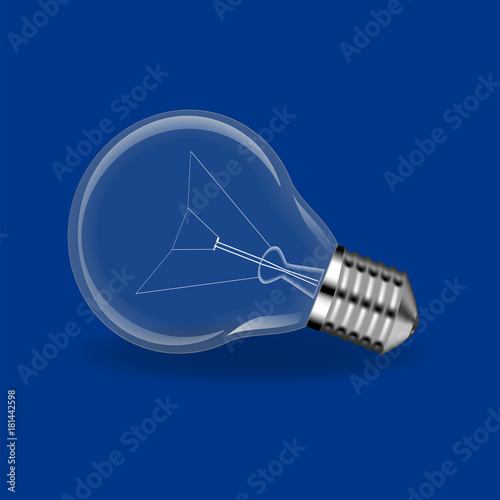 Realistic lit light bulb isolated on white.