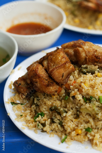 Vietnamese Food with rice chicken and spice sauce